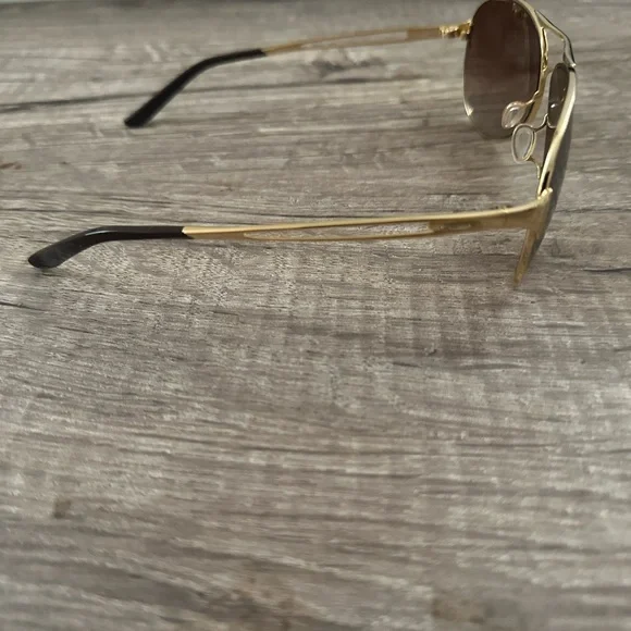 Oakley Sunglasses  Caveat Polished Gold Frame Dark Brown Gradient Lens - Picture 2 of 4